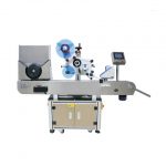 Samolepiaci stroj s povrchovou etiketou na film alebo papier